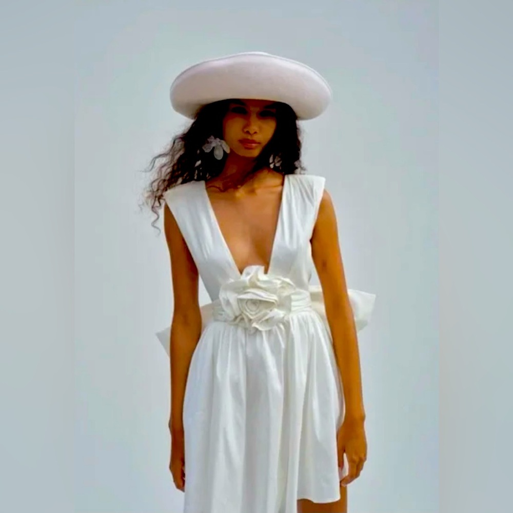 Elegant White Dress with Floral Detail